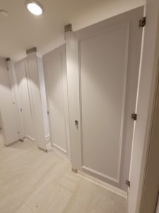 Bathroom with White Toilet Partitions