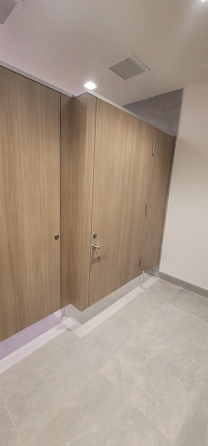 Tan Colored Full-Privacy Toilet Partitions - Privada